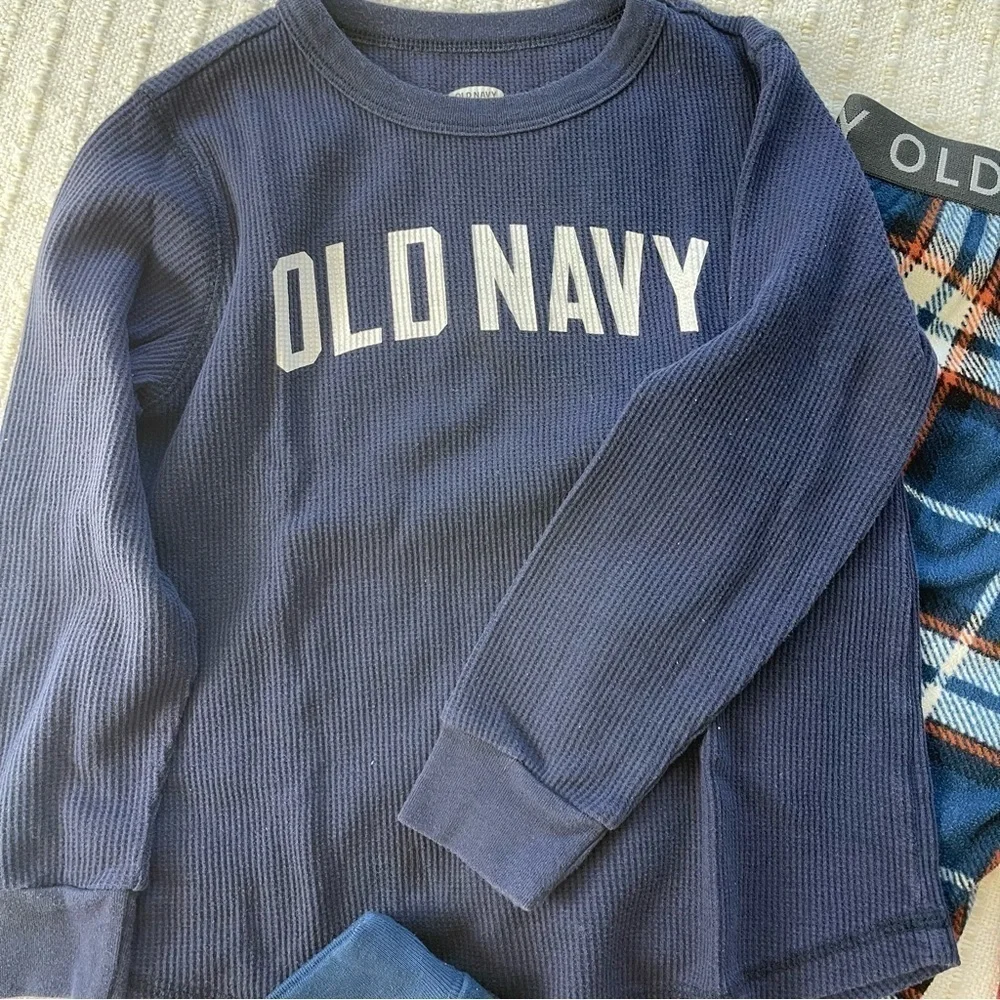 Bundle of two pjs sets by Old Navy and Gap in novelty print and size S (6-7)